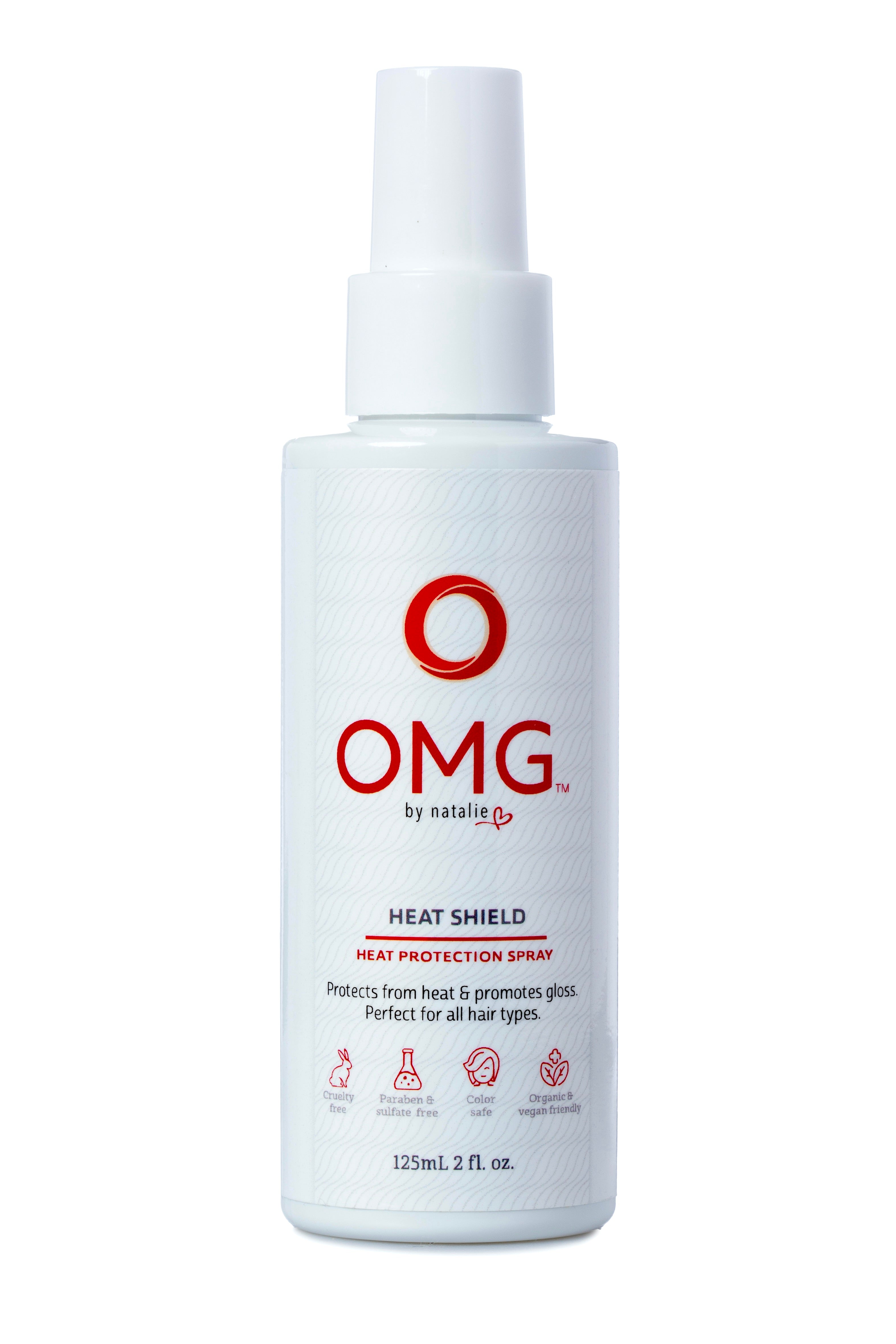 OMG Heat Shield Heat Protection Spray 2 fl. oz.white spray bottle. Protects hair from heat styling tools. Paraben & sulphate free, color safe, natural and certified organic ingredients, vegan friendly.